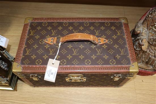 A Louis Vuitton vanity case, serial number 949439 (mirror damaged)